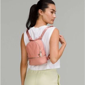 NWT LULULEMON MICRO CITY ADVENTURER BACK PACK BELT BAG IN PINK